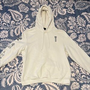H&M Cream Sweatshirt with Intricate Detailing